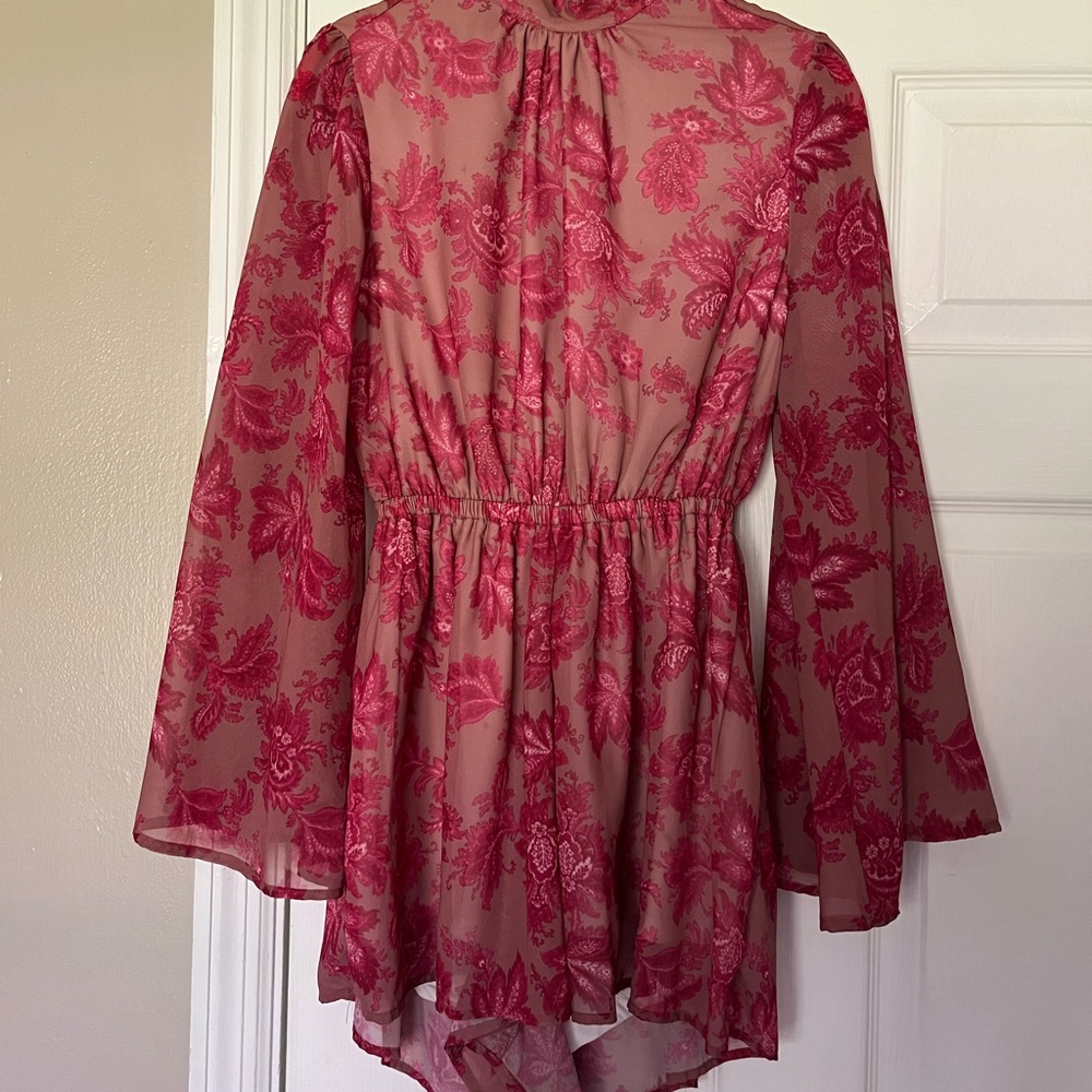 Elegant Pink Floral Romper with Vibrant Pattern